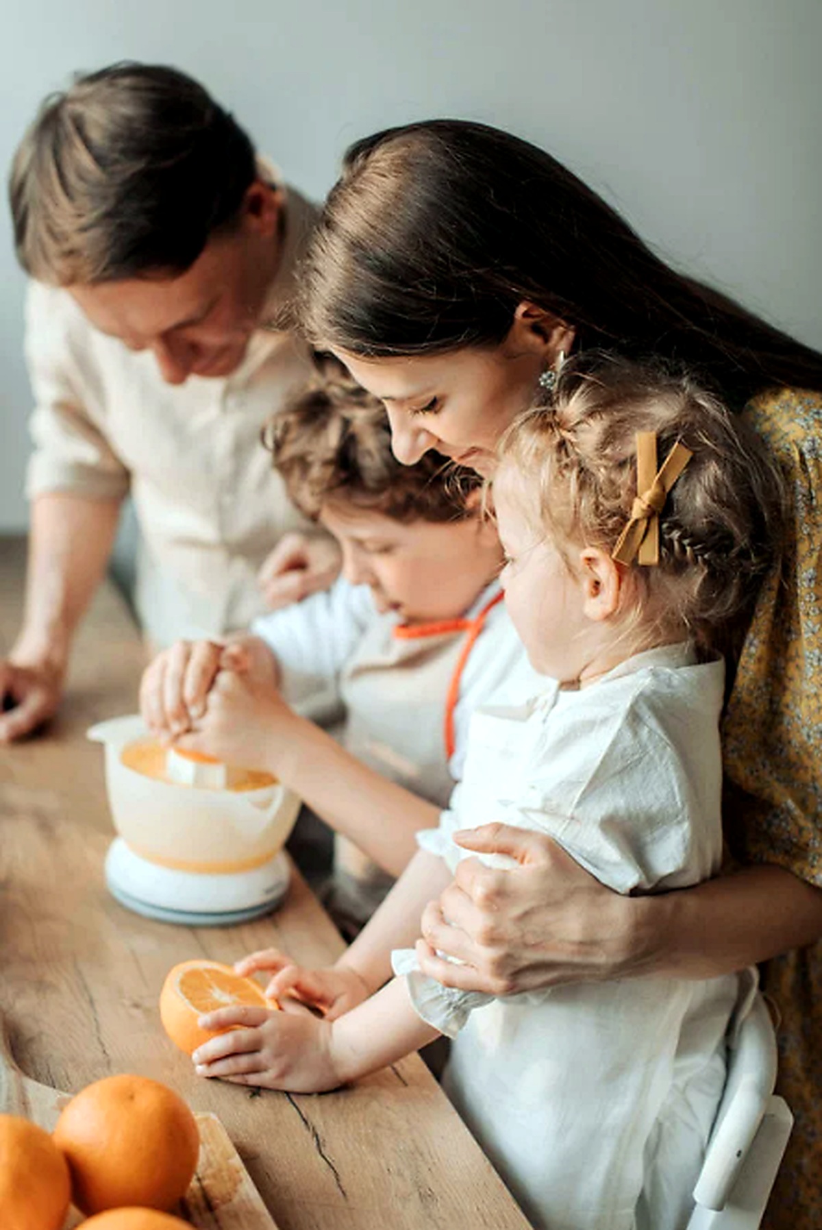 Family learning together at home, representing home education and homeschooling in the UK